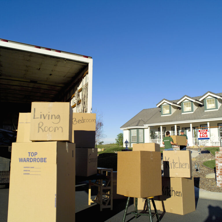 Men moving boxes