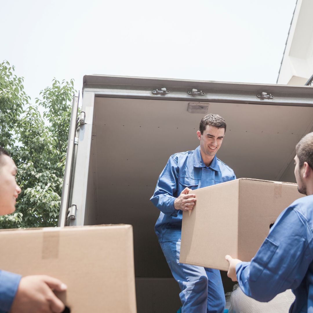 best movers for long distance team loading boxes to take in the new place
